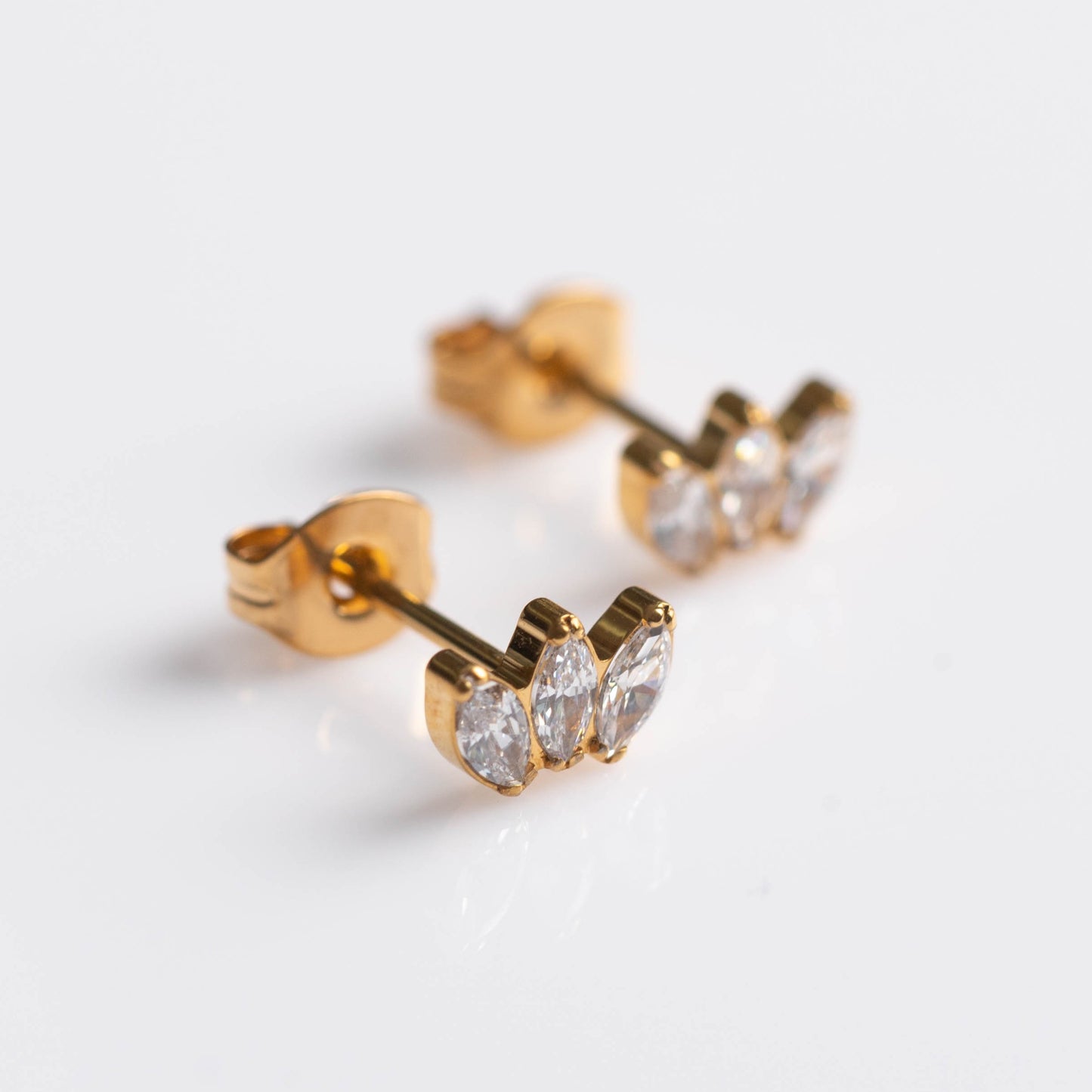 Brinco Marquise Trio Dourado PVD (par) – Titânio