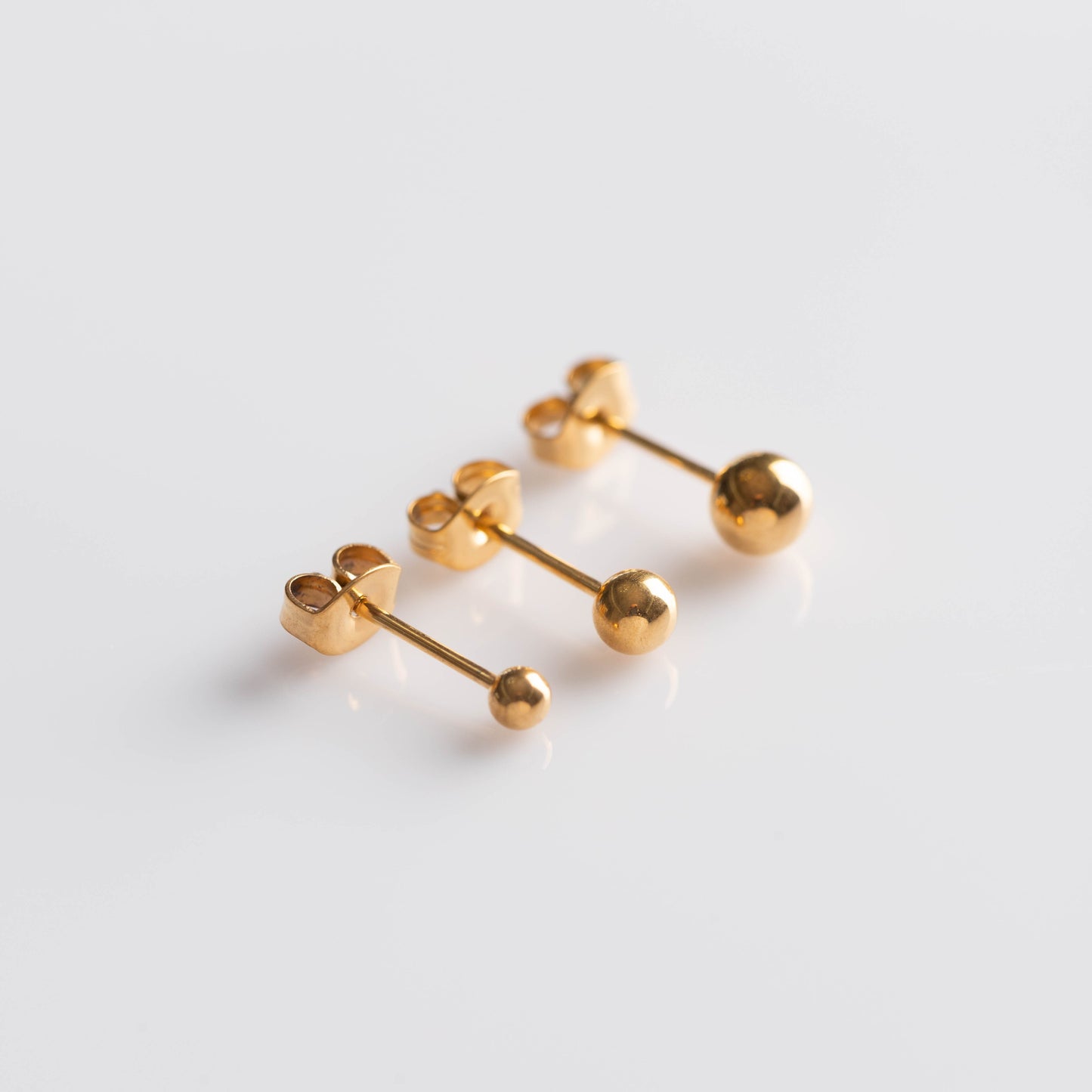Brinco Sphere Dourado PVD - Titânio (par)