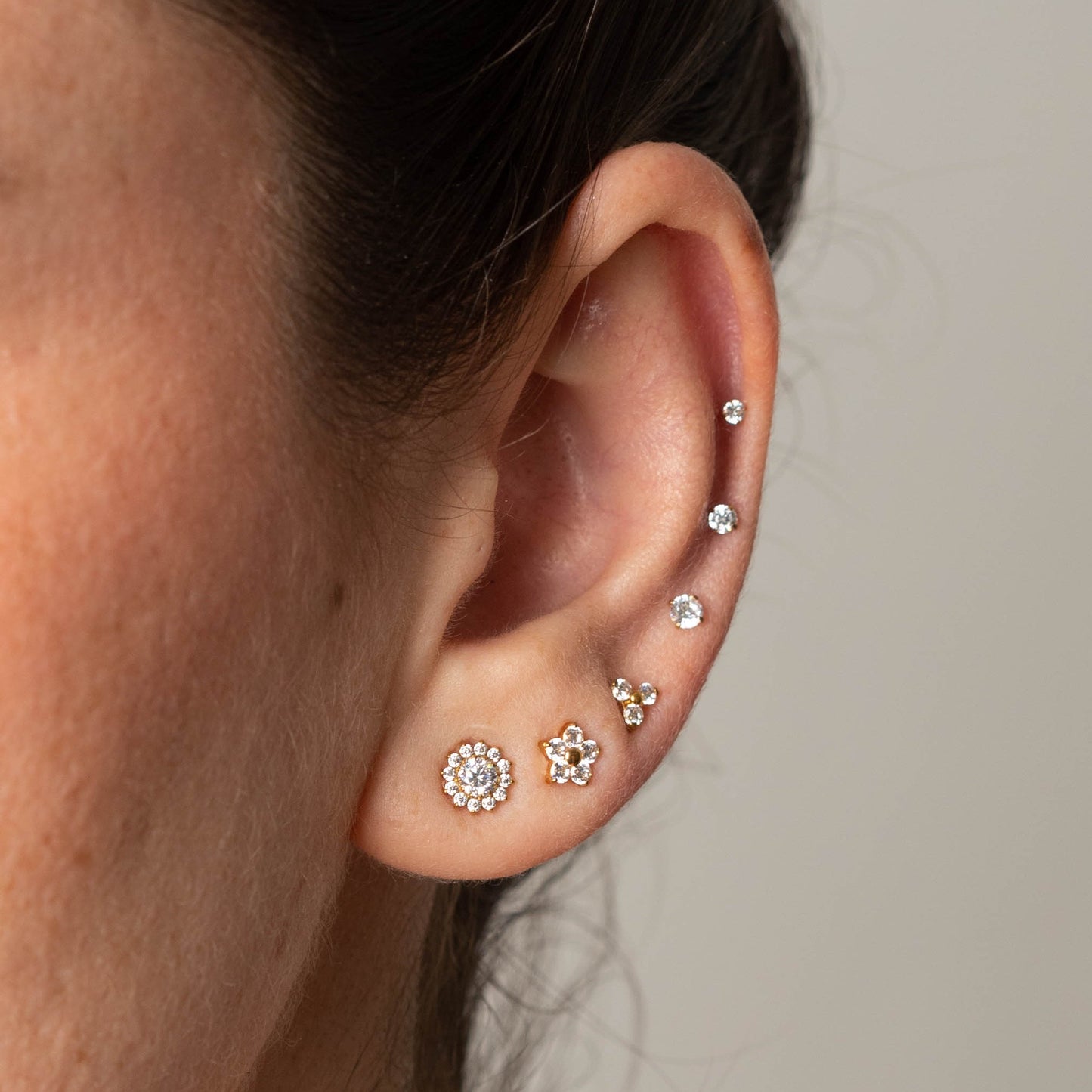 Brinco Bloom Dourado PVD (par) - Titânio