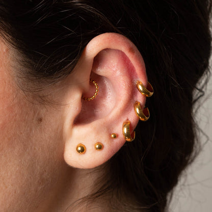 Piercing Argola Orbi PVD Dourado - Titânio