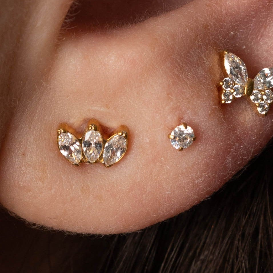 Brinco Marquise Trio Dourado PVD (par) – Titânio