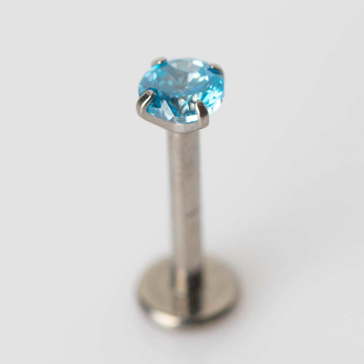 Piercing Ponto de Luz Azul- Titânio